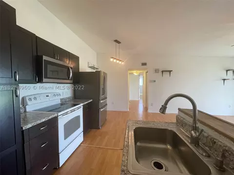 9727 Hammocks Blvd #202D, Miami, FL 33196 photo 1