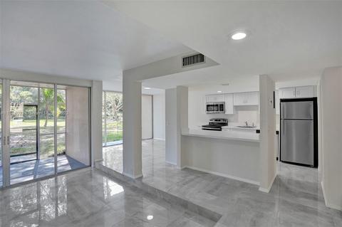 9410 Live Oak Pl #111, Davie, FL 33324