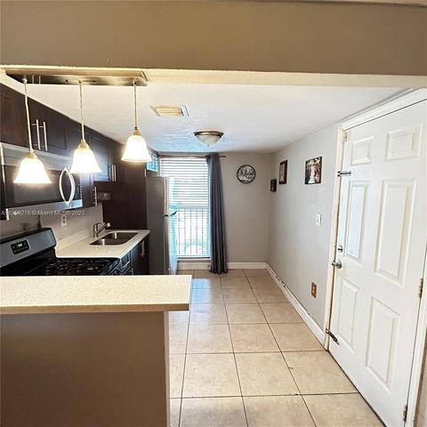 241 S Royal Poinciana Blvd #306, Miami Springs, FL 33166