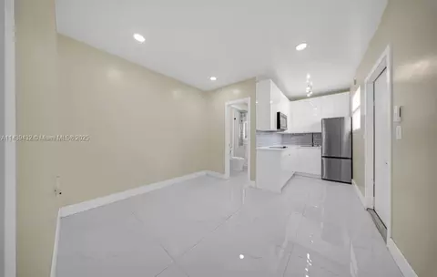 Living - 3360 E 10th Ave, Hialeah, FL 33013 photo 2 of 3