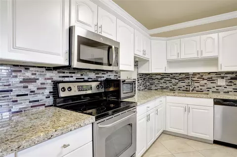 6751 Cypress Rd #411, Plantation, FL 33317