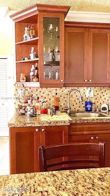 Kitchen - 440 E 23rd St #1402, Hialeah, FL 33013 photo 4 of 8