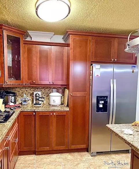 Kitchen - 440 E 23rd St #1402, Hialeah, FL 33013 photo 3 of 8