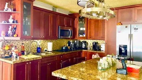 Kitchen - 440 E 23rd St #1402, Hialeah, FL 33013 photo 2 of 8