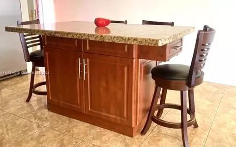 Kitchen - 440 E 23rd St #1402, Hialeah, FL 33013 photo 7 of 8