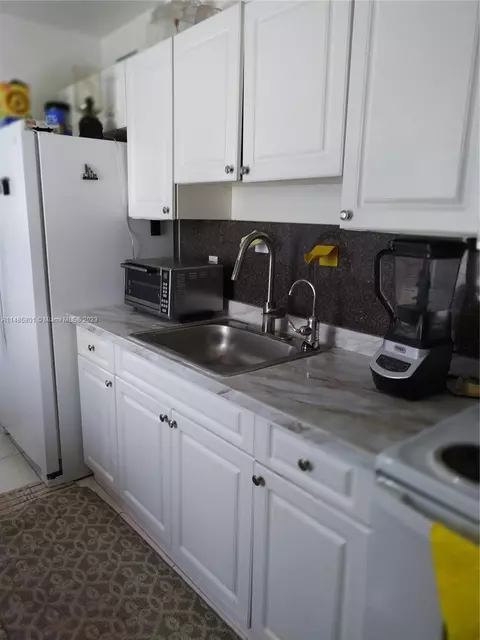 Kitchen - 640 E 14th St, Hialeah, FL 33010 photo 1 of 2