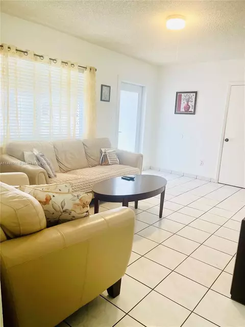 Living - 451 E 60th St, Hialeah, FL 33013 photo 1 of 4