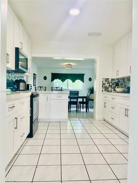 Kitchen - 451 E 60th St, Hialeah, FL 33013 photo 1 of 4