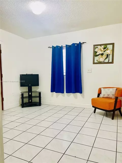Living - 451 E 60th St, Hialeah, FL 33013 photo 4 of 4
