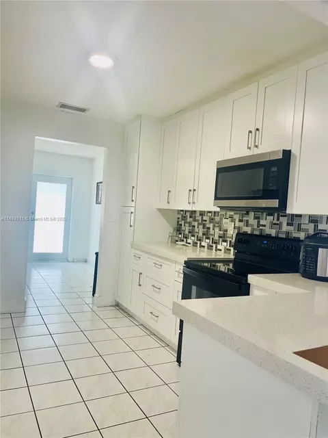 Kitchen - 451 E 60th St, Hialeah, FL 33013 photo 2 of 4