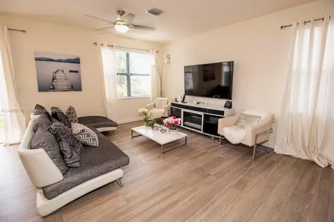 Living - 10038 W 32nd Ln, Hialeah, FL 33018 photo 2 of 5