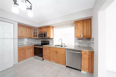 Kitchen - 1739 W 79th St, Hialeah, FL 33014 photo 5 of 6
