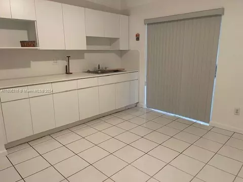 Kitchen - 1365 W 63rd St, Hialeah, FL 33012 photo 3 of 3
