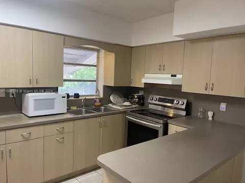 Kitchen - 1365 W 63rd St, Hialeah, FL 33012 photo 1 of 3