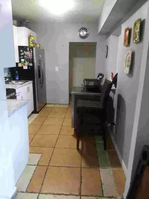 Kitchen - 1100 E 8th Ct, Hialeah, FL 33010 photo 2 of 3