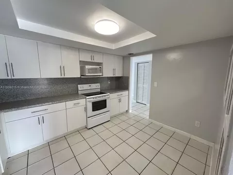 Kitchen - 1705 W 68th St, Hialeah, FL 33014 photo 1 of 3