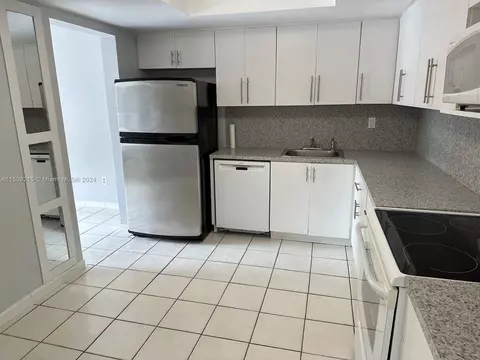 Kitchen - 1705 W 68th St, Hialeah, FL 33014 photo 2 of 3