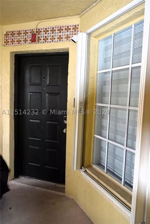 18318 NW 68th Ave #E, Hialeah, FL 33015 photo 1