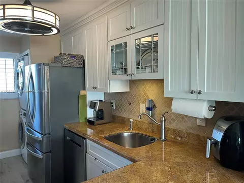 Kitchen - 5463 SE Miles Grant Rd #B211, Stuart, FL 34997 photo 3 of 7
