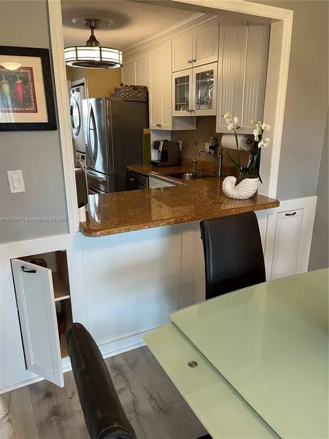 Kitchen - 5463 SE Miles Grant Rd #B211, Stuart, FL 34997 photo 7 of 7
