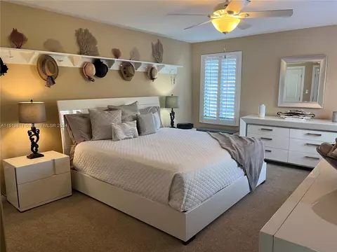 Bedroom - 5463 SE Miles Grant Rd #B211, Stuart, FL 34997 photo 1 of 4