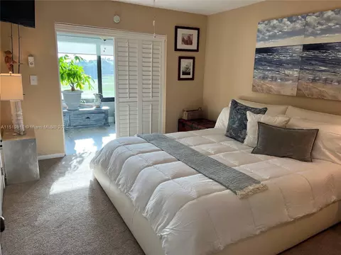 Bedroom - 5463 SE Miles Grant Rd #B211, Stuart, FL 34997 photo 3 of 4