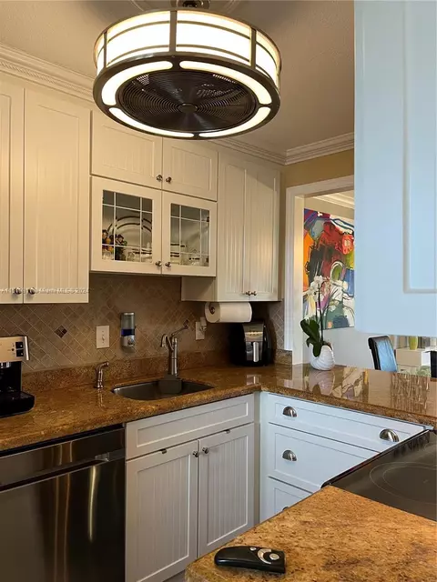 Kitchen - 5463 SE Miles Grant Rd #B211, Stuart, FL 34997 photo 2 of 7