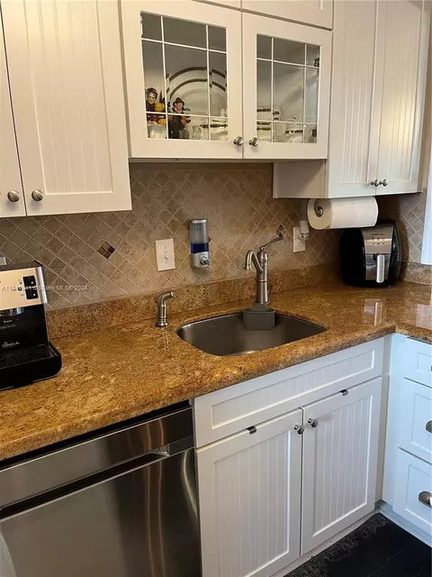 Kitchen - 5463 SE Miles Grant Rd #B211, Stuart, FL 34997 photo 5 of 7