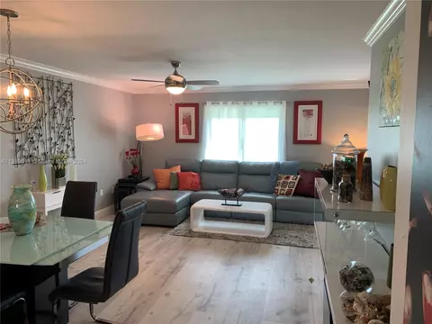 Living - 5463 SE Miles Grant Rd #B211, Stuart, FL 34997 photo 2 of 6