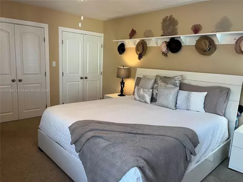 Bedroom - 5463 SE Miles Grant Rd #B211, Stuart, FL 34997 photo 2 of 4
