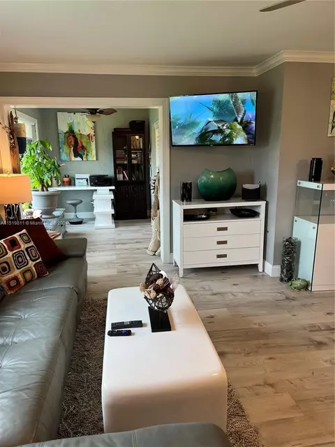 Living - 5463 SE Miles Grant Rd #B211, Stuart, FL 34997 photo 5 of 6