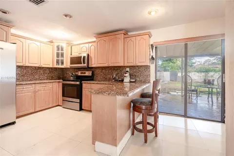 Kitchen - 437 E 56th St, Hialeah, FL 33013 photo 2 of 3