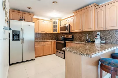 Kitchen - 437 E 56th St, Hialeah, FL 33013 photo 1 of 3