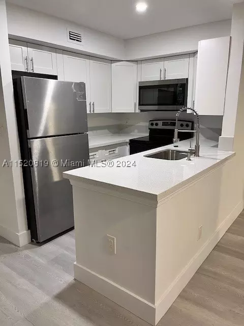 10020 Winding Lake Rd #104, Sunrise, FL 33351