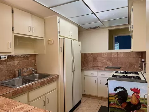 Kitchen - 3741 E 8th Ct, Hialeah, FL 33013 photo 2 of 2