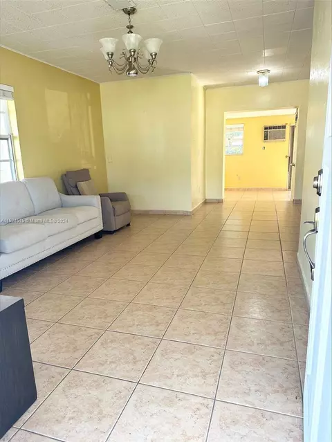 Living - 3741 E 8th Ct, Hialeah, FL 33013 photo 2 of 4
