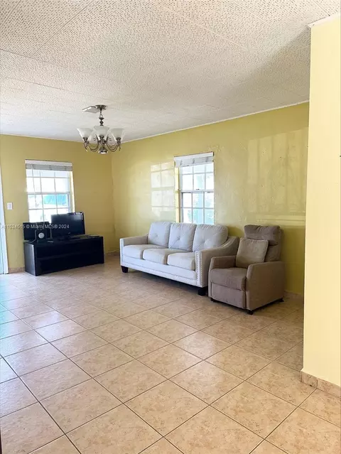 Living - 3741 E 8th Ct, Hialeah, FL 33013 photo 3 of 4