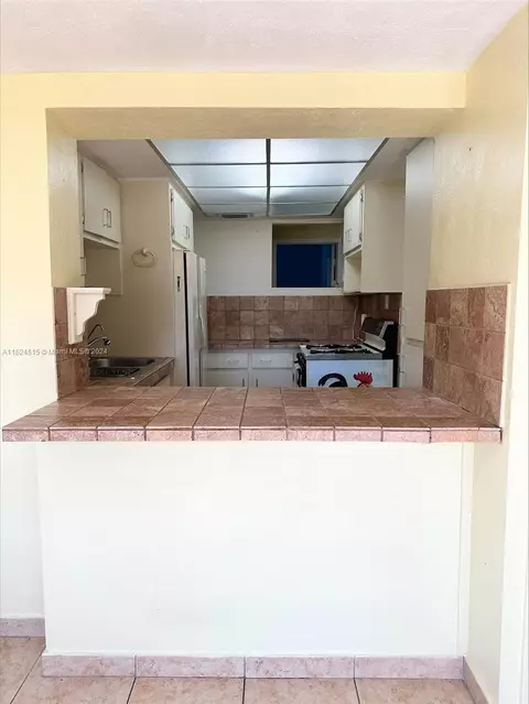Kitchen - 3741 E 8th Ct, Hialeah, FL 33013 photo 1 of 2