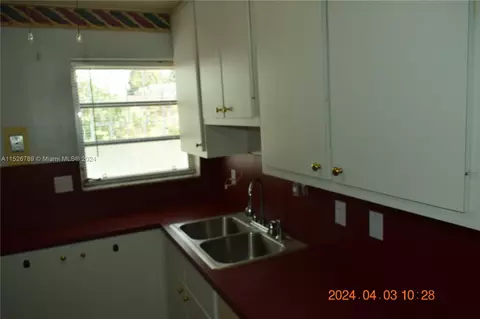 Kitchen - 891 W 53rd St, Hialeah, FL 33012 photo 2 of 5