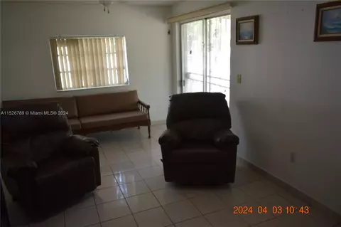 Living - 891 W 53rd St, Hialeah, FL 33012 photo 4 of 5