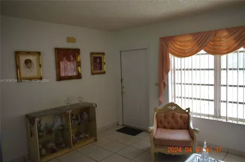 Living - 891 W 53rd St, Hialeah, FL 33012 photo 3 of 5