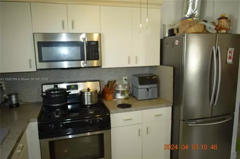 Kitchen - 891 W 53rd St, Hialeah, FL 33012 photo 5 of 5