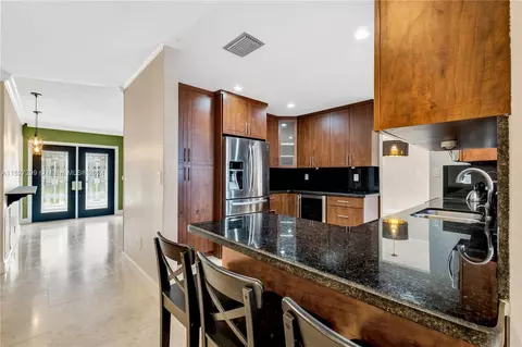 Kitchen - 19320 E Saint Andrews Dr, Hialeah, FL 33015 photo 3 of 4