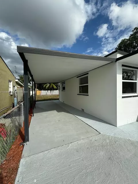 Exterior - 825 Codadad St, Opa Locka, FL 33054 photo 6 of 9