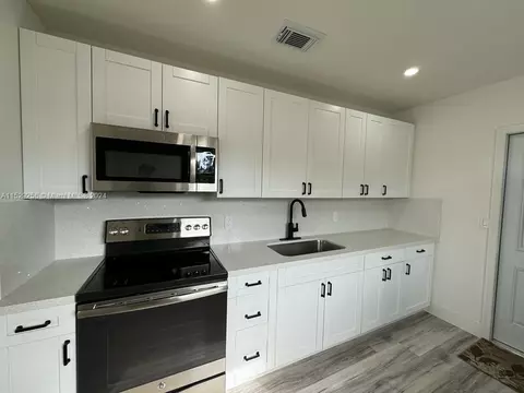 Exterior - 825 Codadad St, Opa Locka, FL 33054 photo 3 of 9