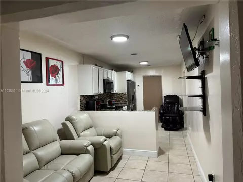 Living - 1179 W 40th Pl, Hialeah, FL 33012 photo 1 of 3