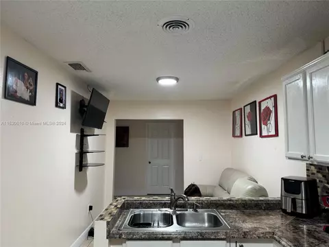Kitchen - 1179 W 40th Pl, Hialeah, FL 33012 photo 4 of 4