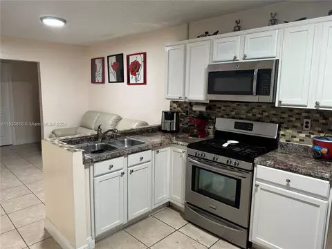 Kitchen - 1179 W 40th Pl, Hialeah, FL 33012 photo 2 of 4