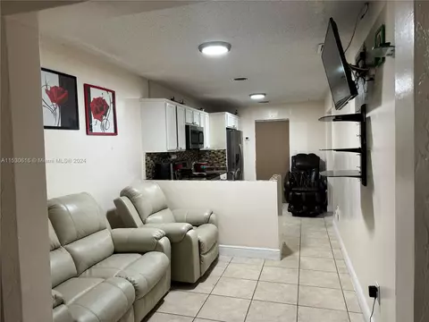 Living - 1179 W 40th Pl, Hialeah, FL 33012 photo 2 of 3
