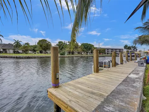 455 Golden Isles Dr #202, Hallandale Beach, FL 33009